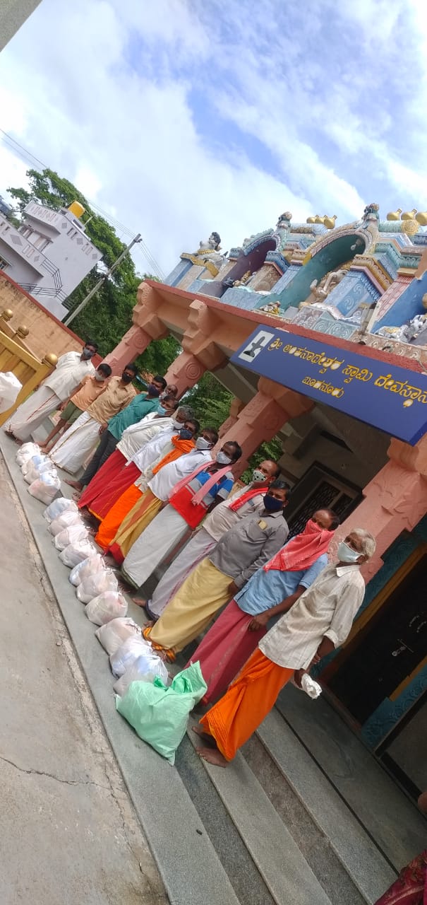 Ration kits gathered at a village temple for distribution to families who lost daily wages.