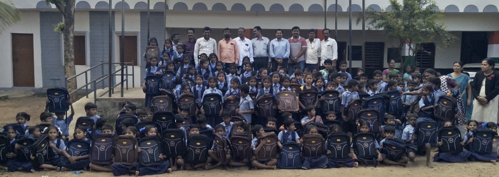 A full government primary school receives bags, books and stationery from Hongirana volunteers.